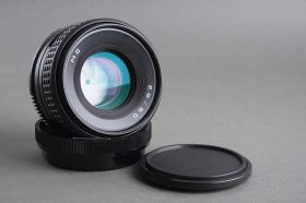 A Russian lens with Pentacon Six mount. Only marked 2.8 / 80 MC (probably Volna or Arsat?)