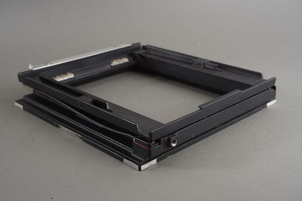 Part of 5×7 Sinar spring loaded film holder back, no screen