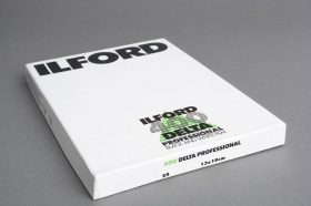 sealed box of Ilford Delta 400 13×18 cm film, 25 sheets, expired 04/2001