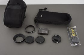 Small lot of Nikon accessories in CL-M3 lens case / pouch
