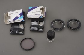 Small lot of Olympus items: reverse mounts, filter, diopters, case