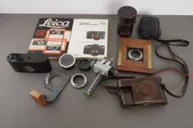 Lot of Leica related accessories and parts, cases, books, etc