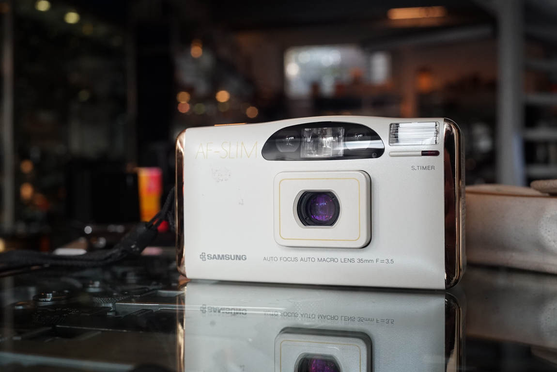 Samsung AF-Slim, White/Gold version. Compact camera - Fotohandel Delfshaven  / MK Optics