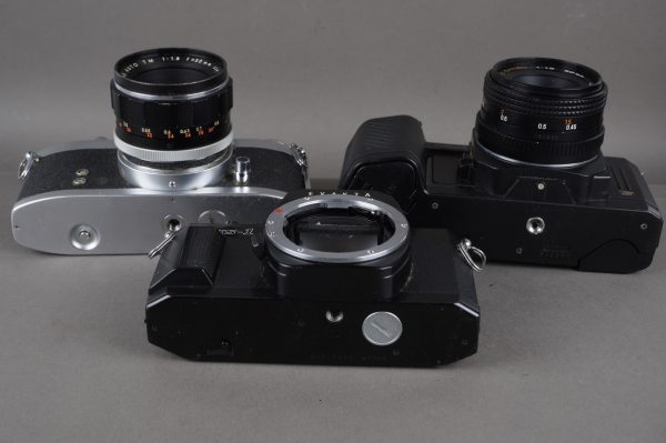 3x SLRs with defects, two with lenses