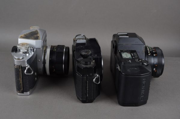 3x SLRs with defects, two with lenses