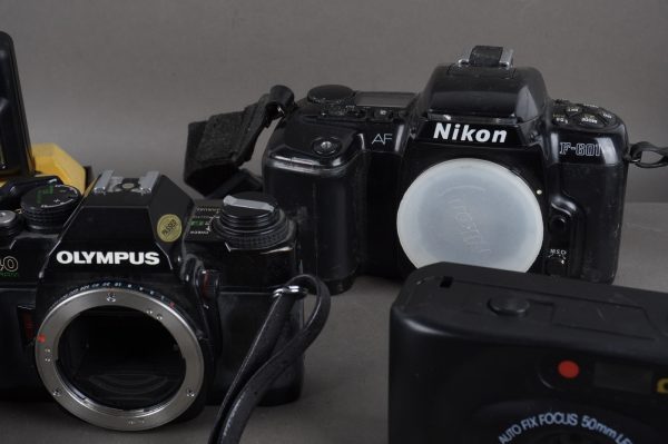 5x vintage cameras: Nikon, Olympus, Kodak, Minolta, Omega