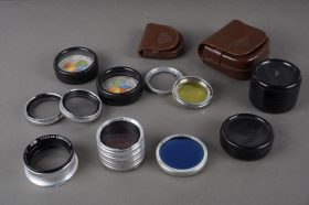 a bunch of Rollei filters: Bay I Duttos, Bay II IR, parts of Rolleinars + cases