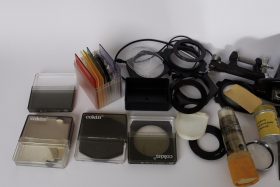 various classic camera and lens accessoires, check pictures