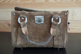 A beautiful leather vintage camera outfit bag