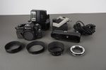 assorted lot of branded accessories (Canon, Olympus, Minolta, Nikon) + Nikon EM
