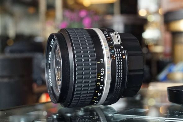 Nikon Nikkor 24mm 1:2.8 AIs lens + HN-1 hood