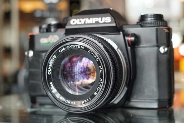 Olympus OM40 Program + Olympus F. Zuiko 50mm 1:1.8 MC
