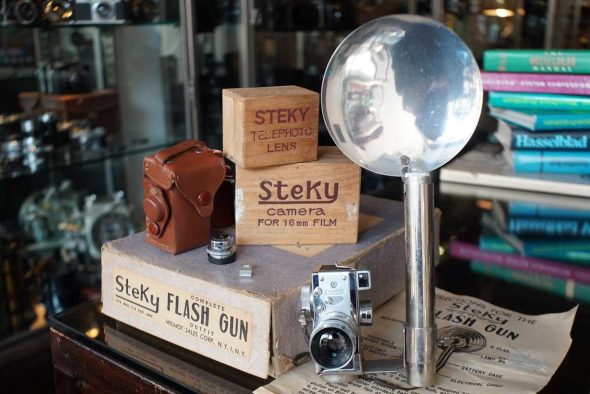 steky outfit with extra lens and flash, in wooden cases