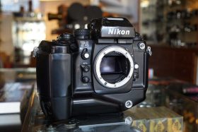 Nikon F4 body with MB-21 grip, worn
