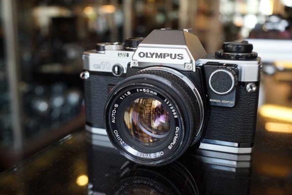 Olympus OM-10 + 50mm F/1.8 and manual adapter