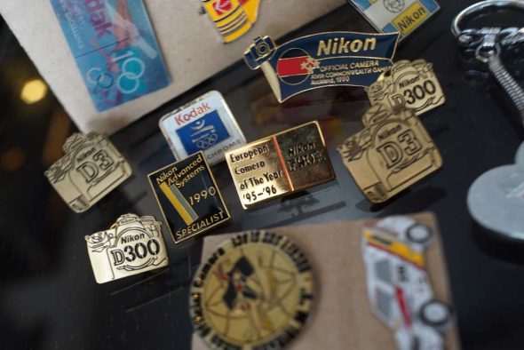 19x Nikon and Kodak related vintage pins and keyrings