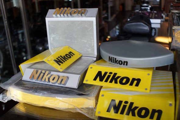 Lot of various Nikon camera display stands