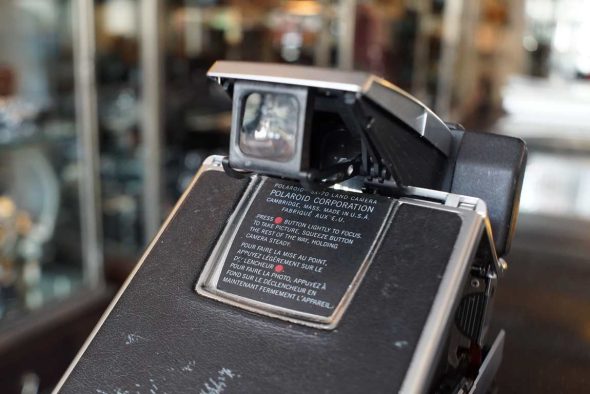 Polaroid SX-70 Sonar AF, worn