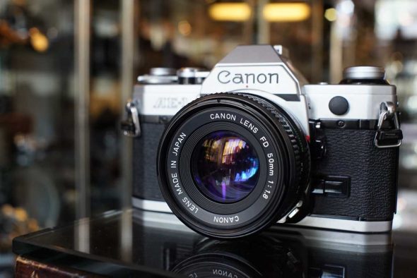 Canon AE-1 + nFD 50mm f/1.8 kit