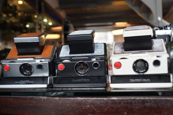 Polaroid SX70 lot of 3, Silver, White, and Black Outlet