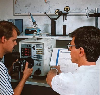 Levi and Alan behind the shutter tester. 