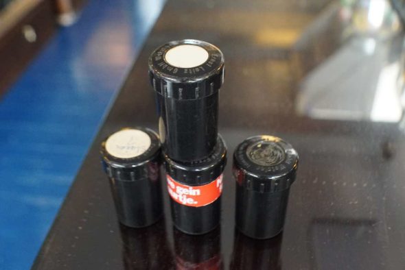 Lot of various Leica film cannisters and film cases