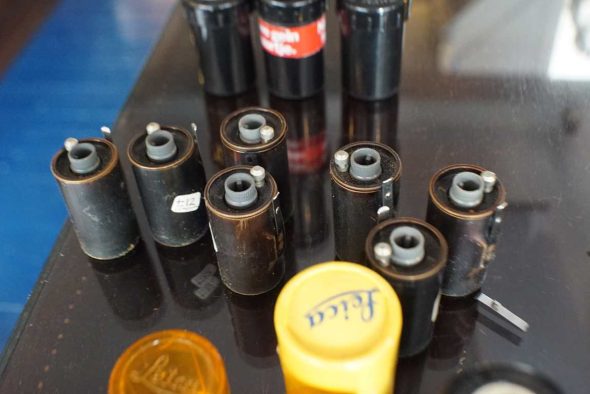 Lot of various Leica film cannisters and film cases