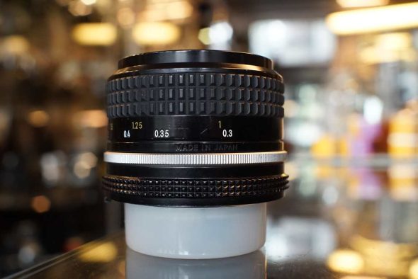 Nikon Nikkor 28mm F/3.5 AI lens, worn + HN-2 lenshood