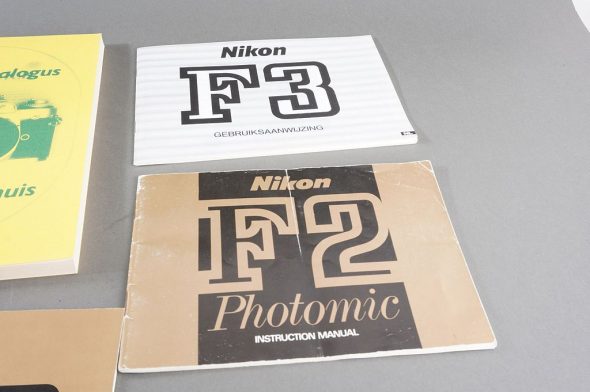 Lot Nikon Manuals: F2 (english, F3, (Dutch), FE2 (German) + Nikon Catalogue by Hans Braakhuis
