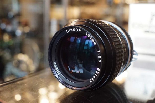Nikon Nikkor 105mm F/2.5 AI lens, boxed