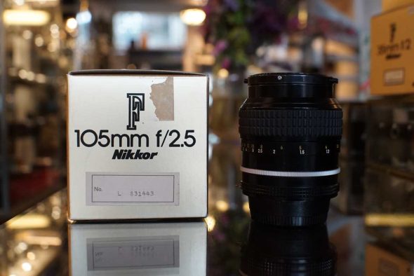 Nikon Nikkor 105mm F/2.5 AI lens, boxed