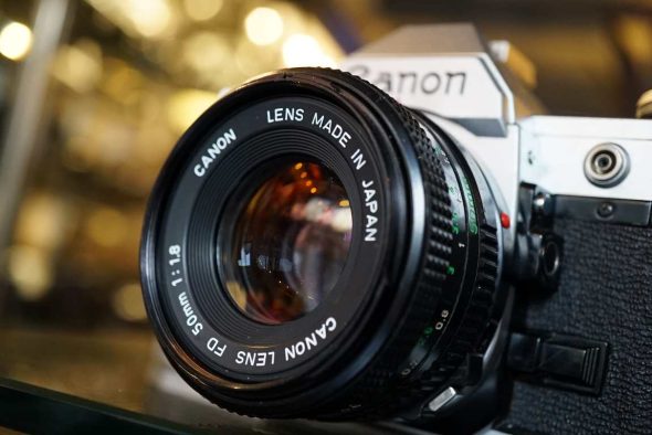 Canon AE-1 chrome + nFD 50mm f/1.8 lens