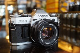 Canon AE-1 chrome w/ nFD 50mm f/1.8