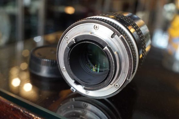 Nikon Nikkor 135mm f/2.8 AI lens, worn