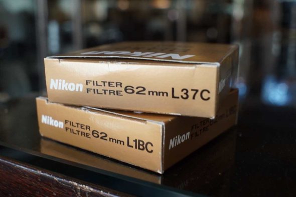 Nikon 62mm L37C UV filter and L1BC Skylight filters, boxed