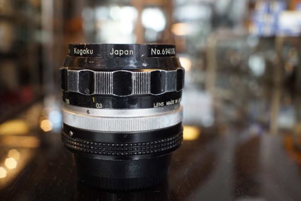 Nippon Kogaku NIkkor-O 1:2 / 35mm with AI ring, Worn