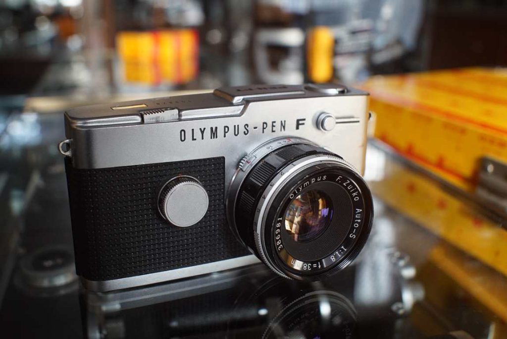Olympus Pen FT in silver with the beautiful rendering 38mm lens. Super nice to work with kit. All shutter speeds are within tolerance. Light seals have been replaced by Thom. Light meter is tested and found to be accurate on all EV values. Lens is clean and focuses well. Film tested and results are prefect. Nice to work with and travel friendly half frame camera. more than 70 frames per roll, takes some time to finish.