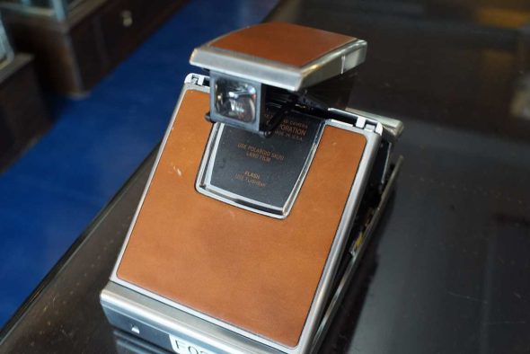 Polaroid SX-70 silver/brown camera in brown leather case