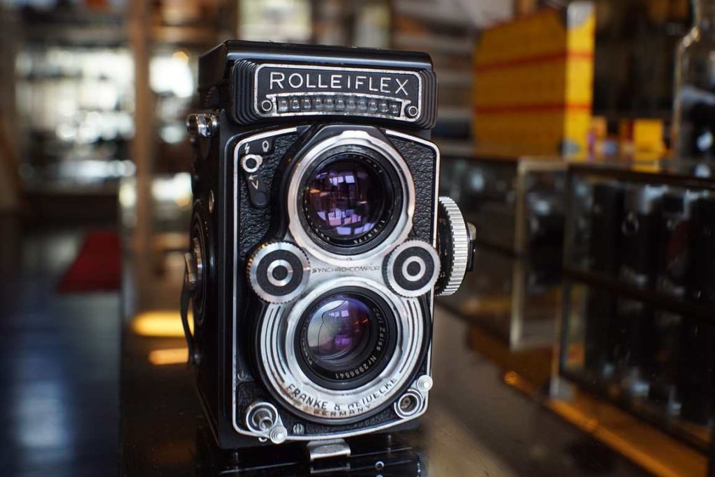 This Rolleiflex 3.5F comes with Planar lens. Cosmetically good with some regular wear on the name plates on the front, slight wear on the crank side. Shutter received a tune up by our in house technician and now operates accurately again. Selft timer is working as well though lever needs to be helped to get going a bit. The settings dials turn silky smooth and focus is also smooth with good dampening. Light meter works and is accurate on our test equipment. Lenses are in good shape, free of haze and fungus.