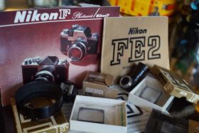 Lot of various Nikon accessories and manuals