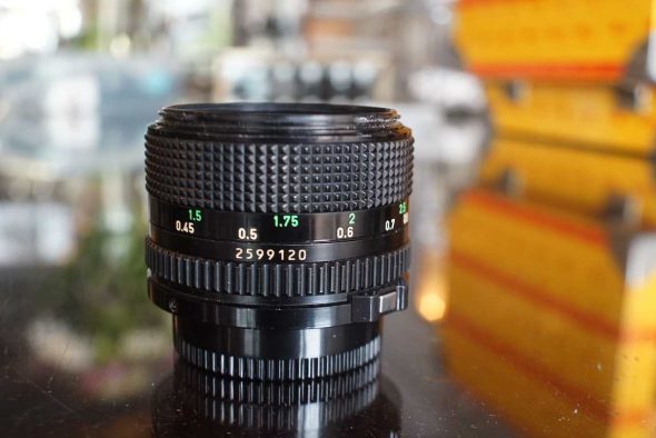 Canon nFD 50mm f/1.4 + BS-52 hood