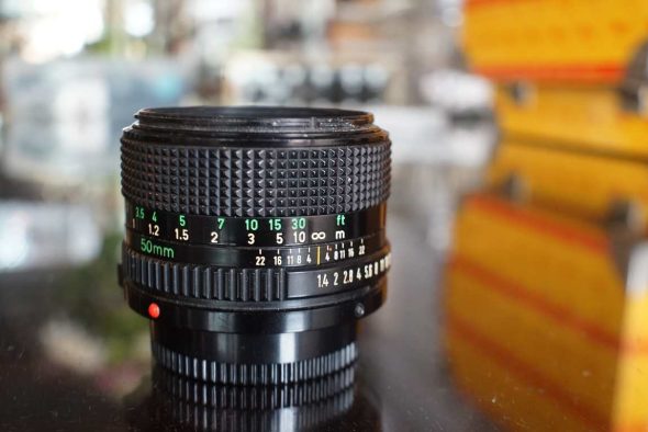 Canon nFD 50mm f/1.4 + BS-52 hood