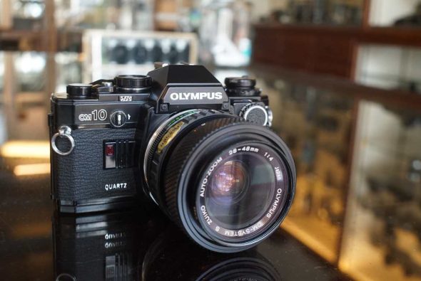 Olympus OM10 Black kit w/ Zuiko 28-48mm f/4 lens