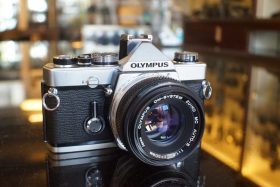 Olympus OM-1n kit w/ 50mm f/1.8 lens