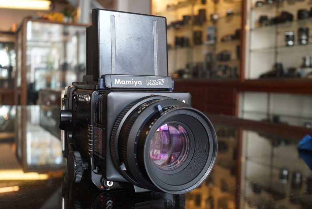 Mamiya RZ67 Pro kit with the much sought after 110mm f/2.8 Sekor Z in the later W version and a more modern Pro II 120 film back. The camera is in very good condition with some light regular wear from normal use. Focus turns smoothly with good dampening and the focus lock also works. Gridline focusing screen installed. Transport also works correctly with the back that has correct spacing, and being a Pro II back, it has mechanical light seals so no worries about replacing light seals in this one. The 110mm f/2.8 W lens has a tiny bit of internal dust but no haze. The shutter also works perfectly on all speeds, verified by our shutter speed tester. A nice kit ready to go out and be used again.this item comes with a 3 month limited warranty