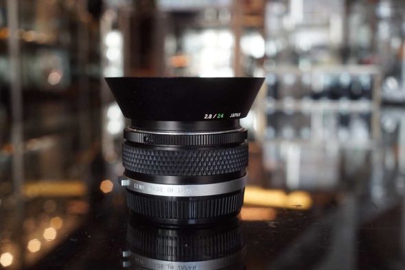 Olympus OM 24mm F/2.8 lens with hood