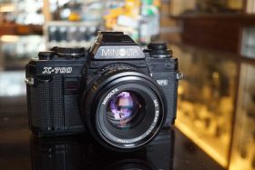 Minolta X700 kit w/ MD 50mm f/1.7, worn body