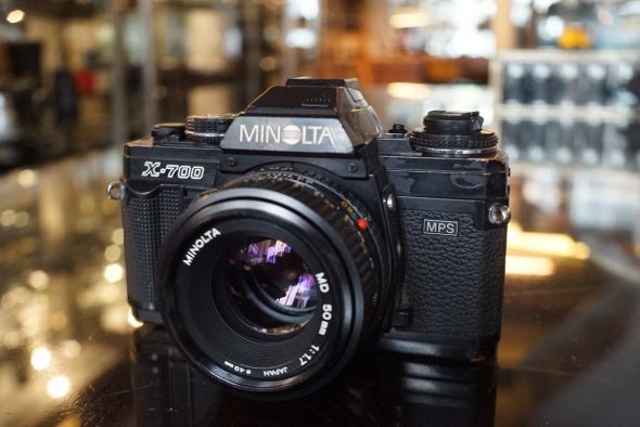 Minolta X700 kit w/ MD 50mm f/1.7, worn body