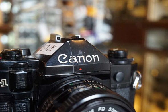 Canon A1 + nFD 50mm f/1.8, OUTLET not working