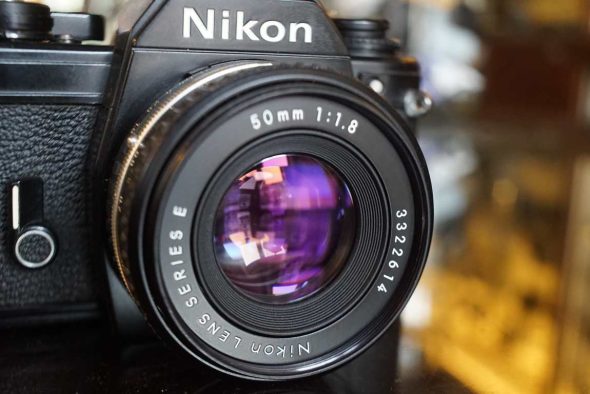 Nikon 50mm f/1.8 E AIS lens w/ free EM back cap